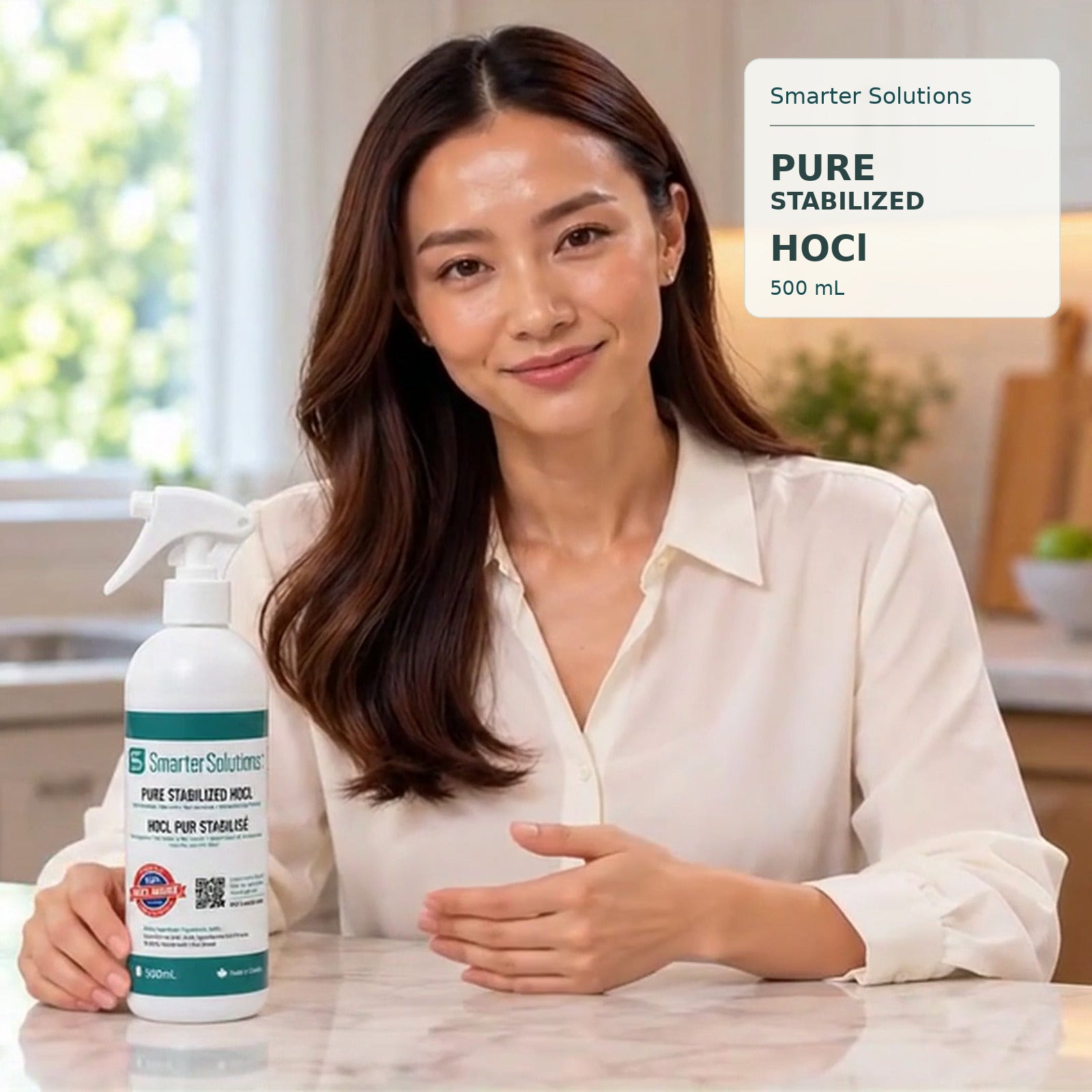 Video featuring Emi in a home kitchen introducing Smarter Solutions Pure Stabilized HOCl 500 mL and its convenient size for everyday routines.